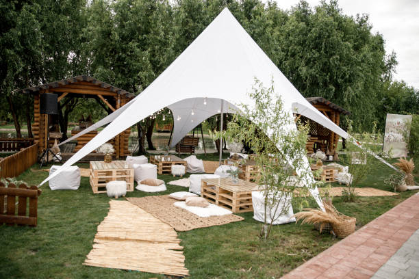 istock Spacious tent in the garden for a wedding party 1415056778