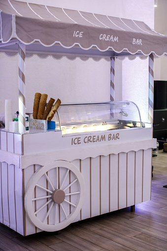 Colorful ice cream cart at the wedding.