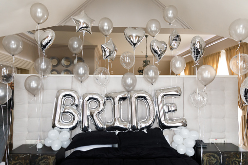 Bright balloons at the wedding gathering in the hotel.