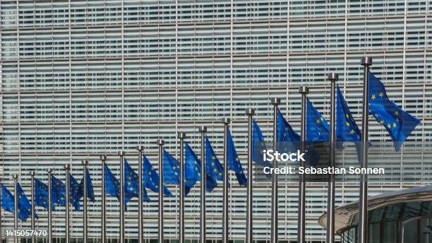 Row Of Eu Flags In Front Of The European Union Commission Building In Brussels Belgium Stock Photo - Download Image Now