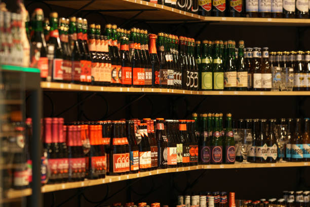 Bruges, Belgium - August 10, 2021: Beer bottles for sale on display in store, Bruges, Belgium stock photo