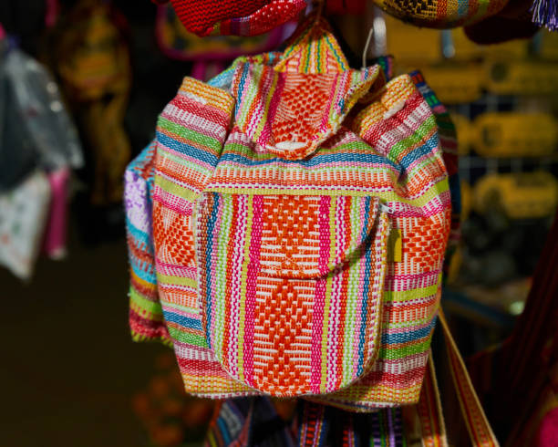 colorful backpack handmade by artisans stock photo