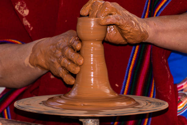 istock A potter man working on a pottery wheel 1415063870