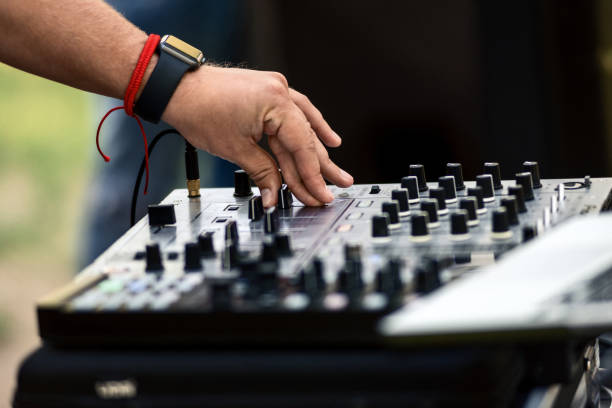 istock Hand on a mixer, operating the leader 1415063898