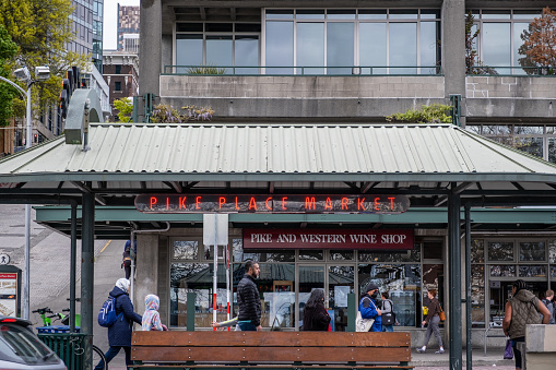 Seattle, WA - May 7, 2022: Pike Place Market bus stop in front of Pike and Western Wine Shop.