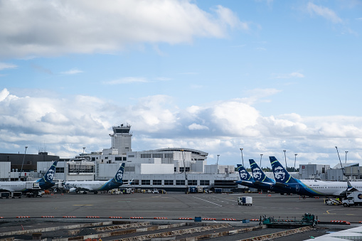 Seattle, WA - May 7, 2022: Alaska Airlines planes on the ramp at SEA.