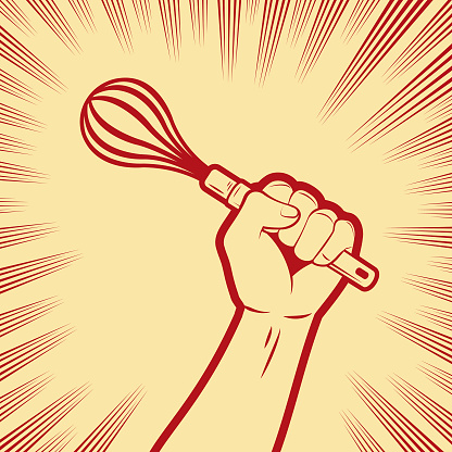 One strong fist holding a wire whisk or egg beater