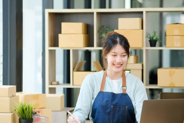 istock Online small business owner checking order. 1415094969