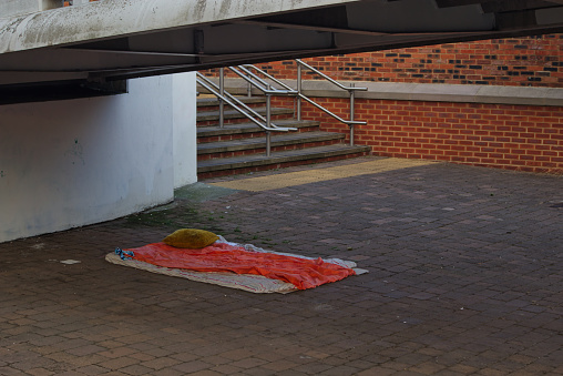 Destitute person's sleeping arrangements on street