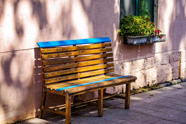 Old wooden benche and flowers