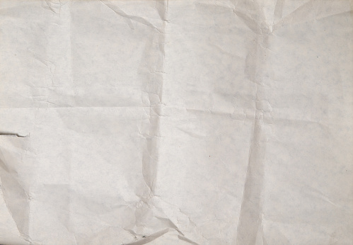 Old wrinkled paper as background