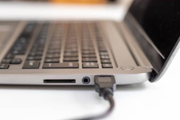 istock Side view of laptop on desk 1415104860