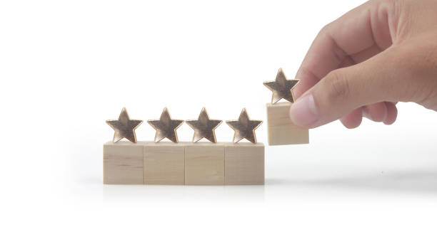 istock Wooden cubes in hand with copy space for input wording 1415111769