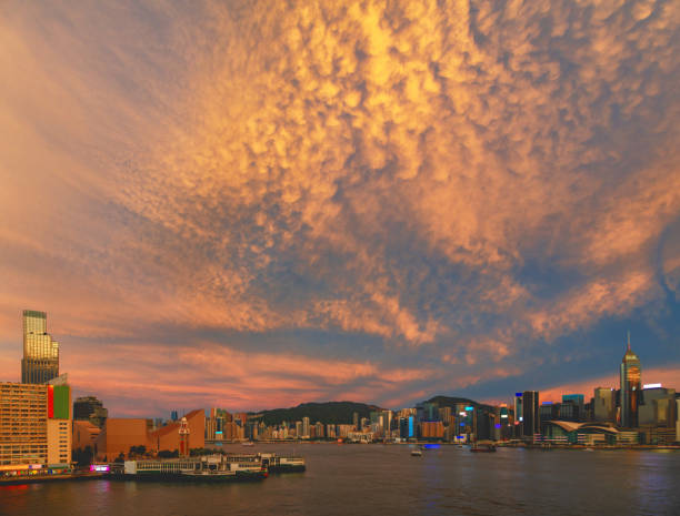 It is rare to see such beautiful colorful clouds looming over Victoria Harbour after sunset.