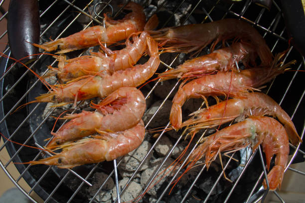 istock king prawns on the BBQ grill 1415113044