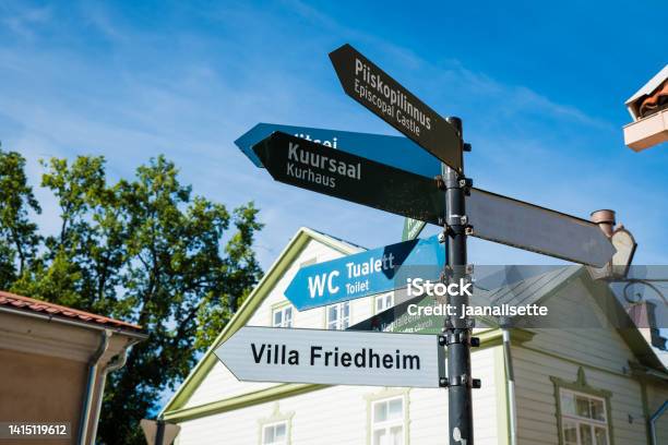 Travel Information Signpost For Haapsalu Visitors Stock Photo - Download Image Now - Arrow Symbol, Capital Cities, Church