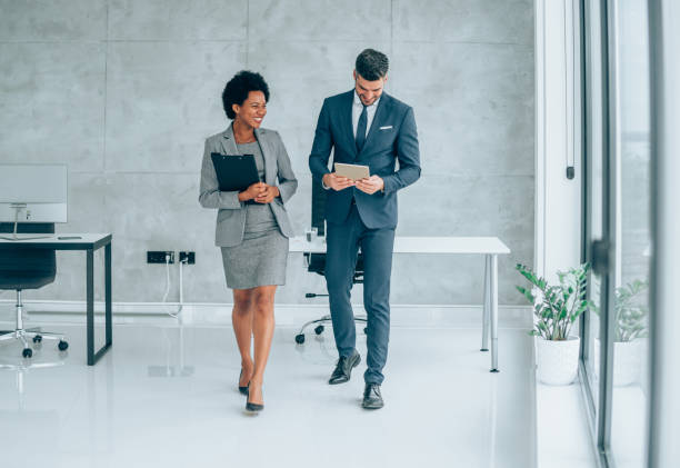 istock Business conversation in the office. 1415121786