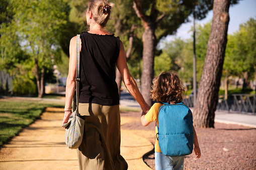 Mother and Son Walking Home from School
