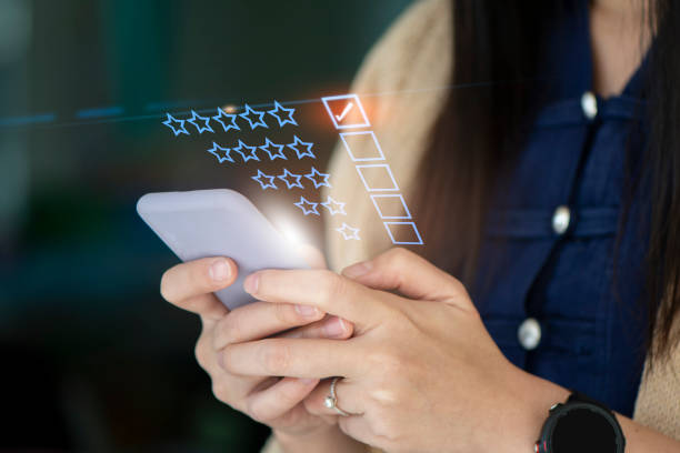 istock User give rating to service experience on online application, 1415122310