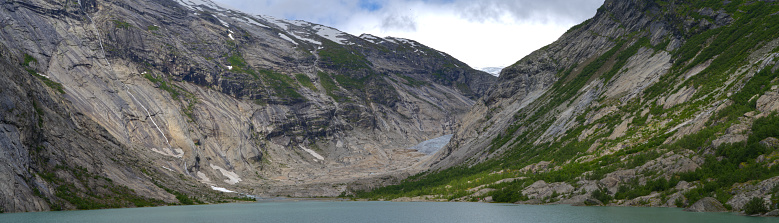 Jostedalsbreen glacier river Nigardsbrevatnet Nigardsbreen part in Norway Europe with blue ice aerial view panorama