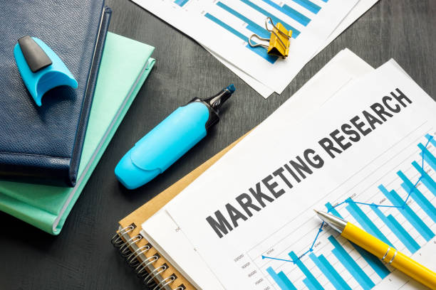 istock Marketing research report with charts and notepads. 1415125103