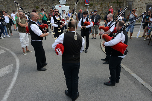 Vannes, France, August 15, 2022 : Biniou players at the Arvor festival in Vannes in Brittany