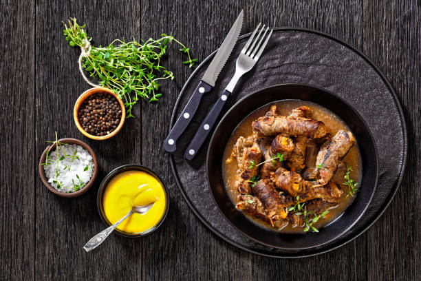 istock german beef rouladen in thick gravy in bowl 1415130252