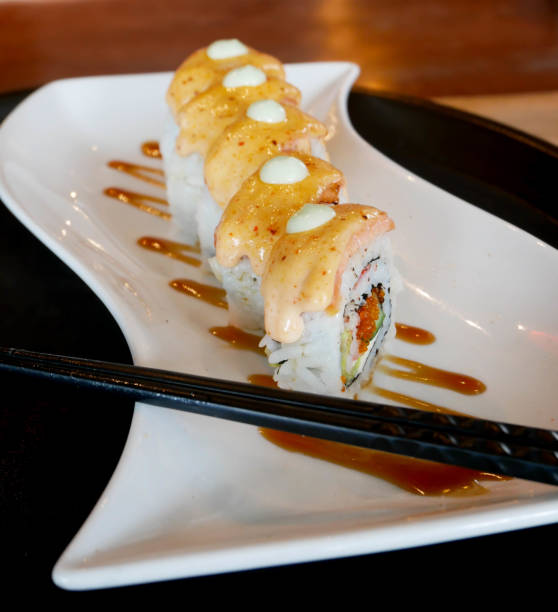 istock Close up - Top View Angle-Salmon Fish roll japanese food 1415133435