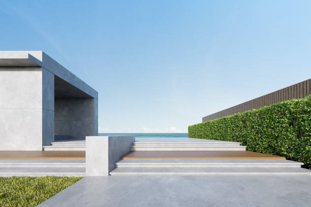 3d рендеринг бетонного здания с деревянной террасой на морском фоне. - hardscape residential structure house real estate стоковые фото и изображения