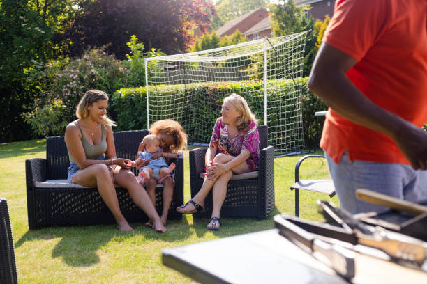 istock Family Chatting in the Sun 1415135971