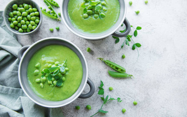 istock Fresh vegetable soup made of green peas 1415138695