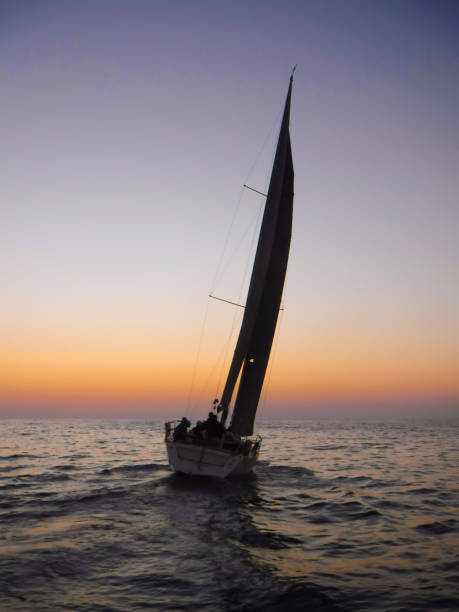istock Sailing yacht at sunset dusk 1415138735