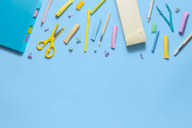 istock Back to School. School supplies and stationery on blue background. Education and studding concept. Banner. Top view, flat lay 1415139321