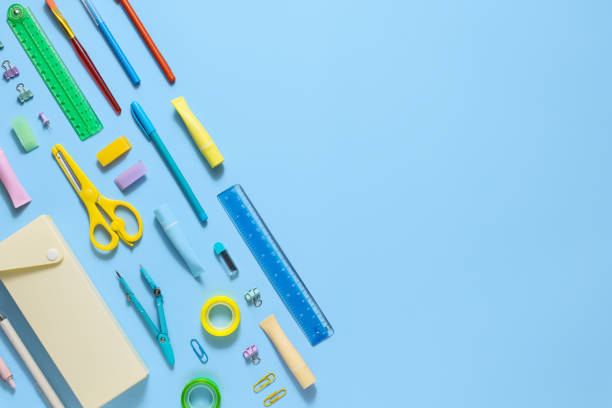 istock Back to School. School supplies and stationery on blue background. Education and studding concept. Banner. Top view, flat lay 1415139607