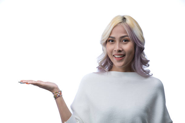 Young asian woman with long flying hair isolated on white background