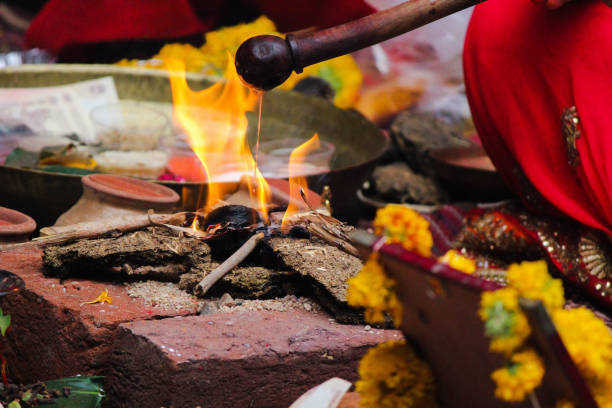 istock Hawan/Pooja Items/Process: Ghrut/ghee aahuti in hawan 1415140842