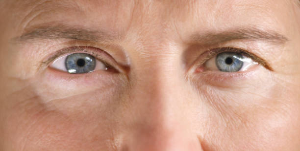 istock Grey eyes of woman 1415144138