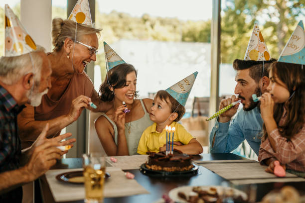 istock Extended family celebrating birthday 1415144153