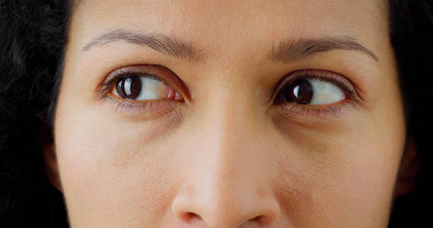 istock Serious woman looking away 1415144166