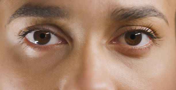 istock Young woman looking at camera 1415144170