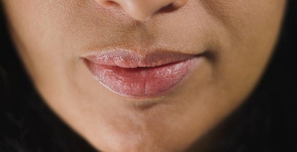 Close-up of lips of mature woman.