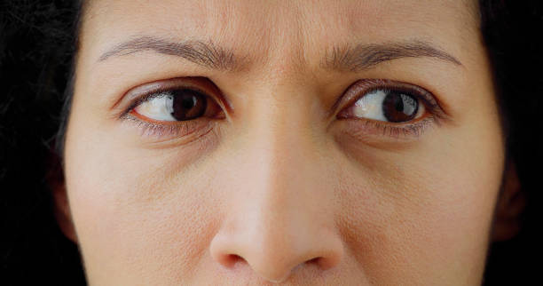istock Serious woman looking away 1415144207