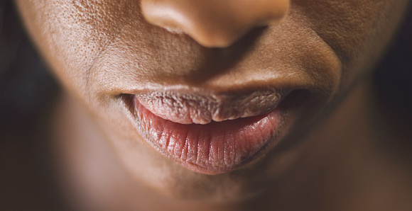 Close-up of lips of mature woman.