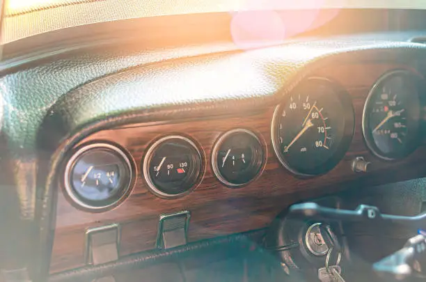 Photo of Instrument panel of an old car. View of the Lada car from the inside.
