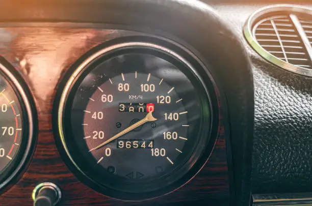 Photo of Instrument panel of an old car. View of the Lada car from the inside.Mileage of the car.