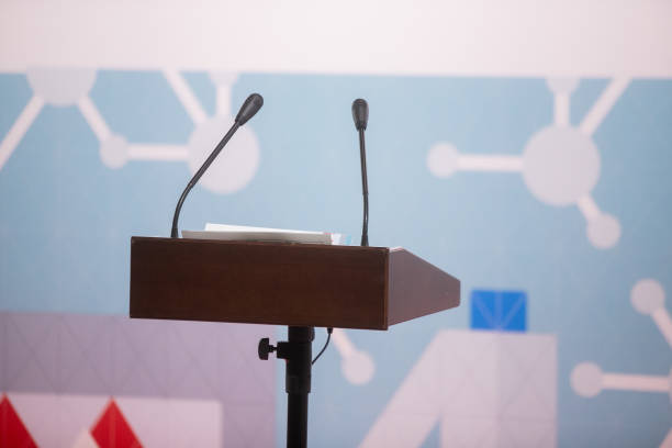 istock Microphone in Conference Seminar room Event Background 1415152542