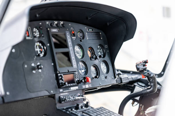 Helicopter control panel close up, front side view Private helicopter control panel close up, front side view. Air vehicle cockpit interior, close view on pilot seat and navigational buttons helicopter seat stock pictures, royalty-free photos & images