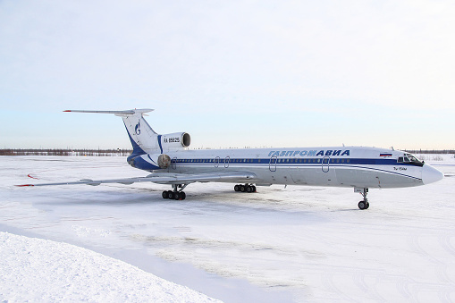 Novyy Urengoy, Russia - March 16, 2014: Gazprom Avia Tupolev Tu-154M at the air field of the Novyy Urengoy Airport.