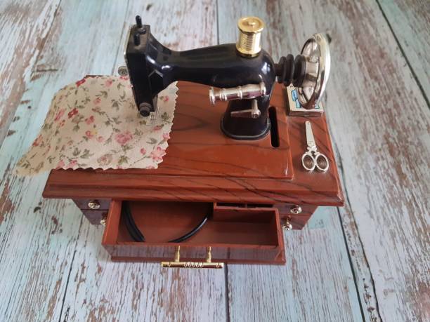 istock Miniature sewing machine and music box, 1415164199