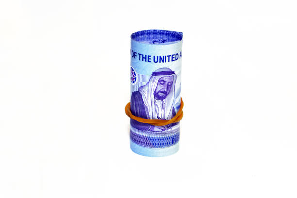 Emirates money roll with Sheikh Zayed bin Sultan Al Nahyan signing the union document from the reverse side of the new polymer commemorative 50 fifty Dirhams of Emirates UAE